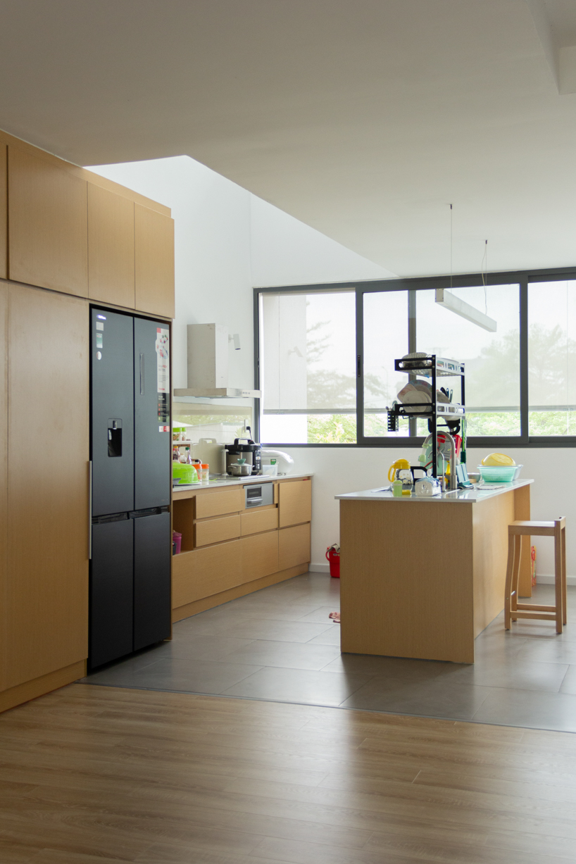 semi-transparent blinds cover the narrow front of 2713 house in vietnam