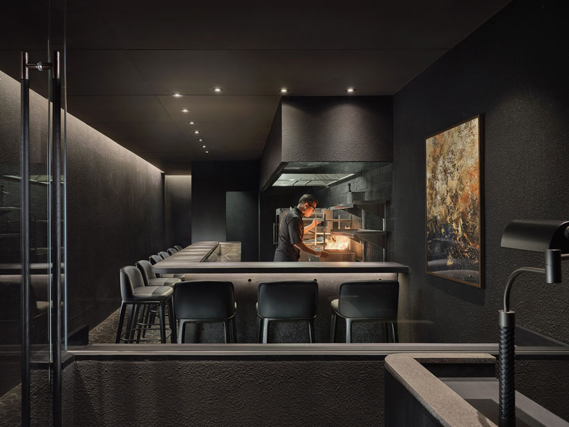 taste space's medley of charcoal textures and tones define the sleek interior of thailand restaurant + bar