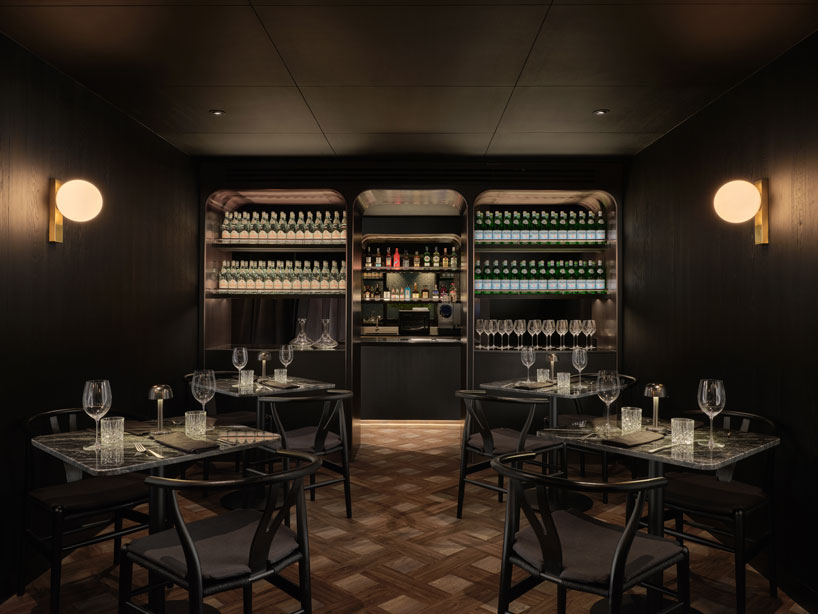 the mixture of textures and charcoal tones of the taste space defines the elegant interior of the thai restaurant + bar