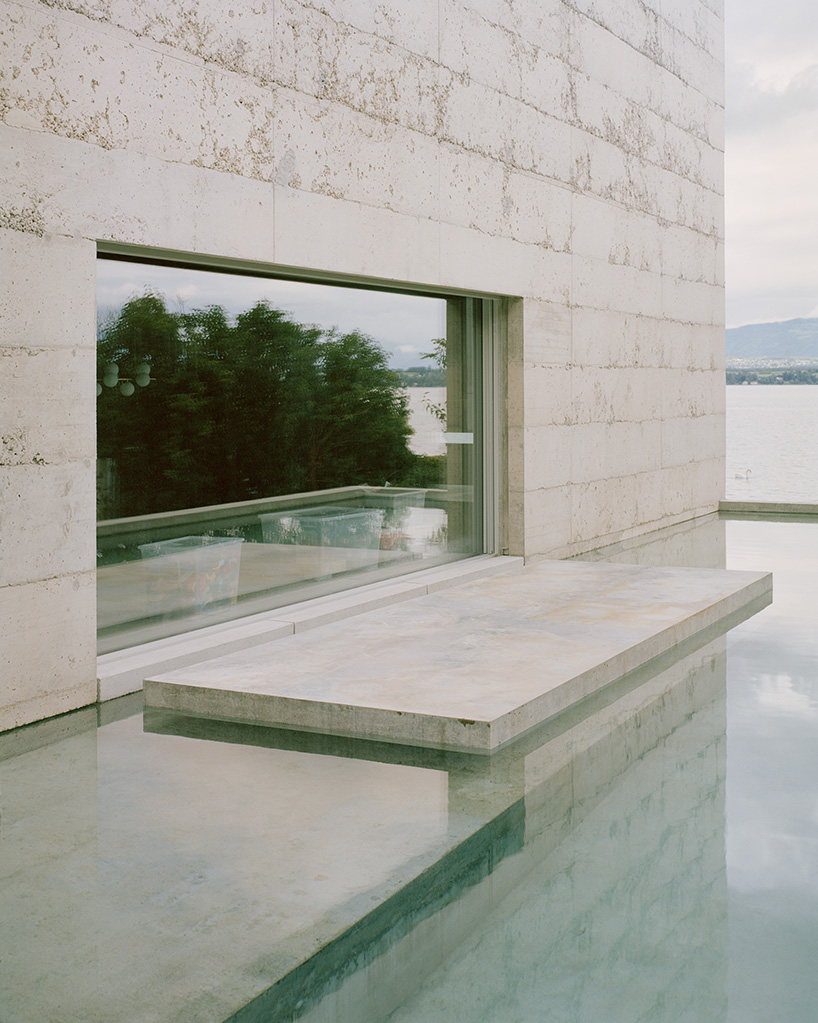 villa montasser's reflections dance on water creating symmetrical geometric compositions