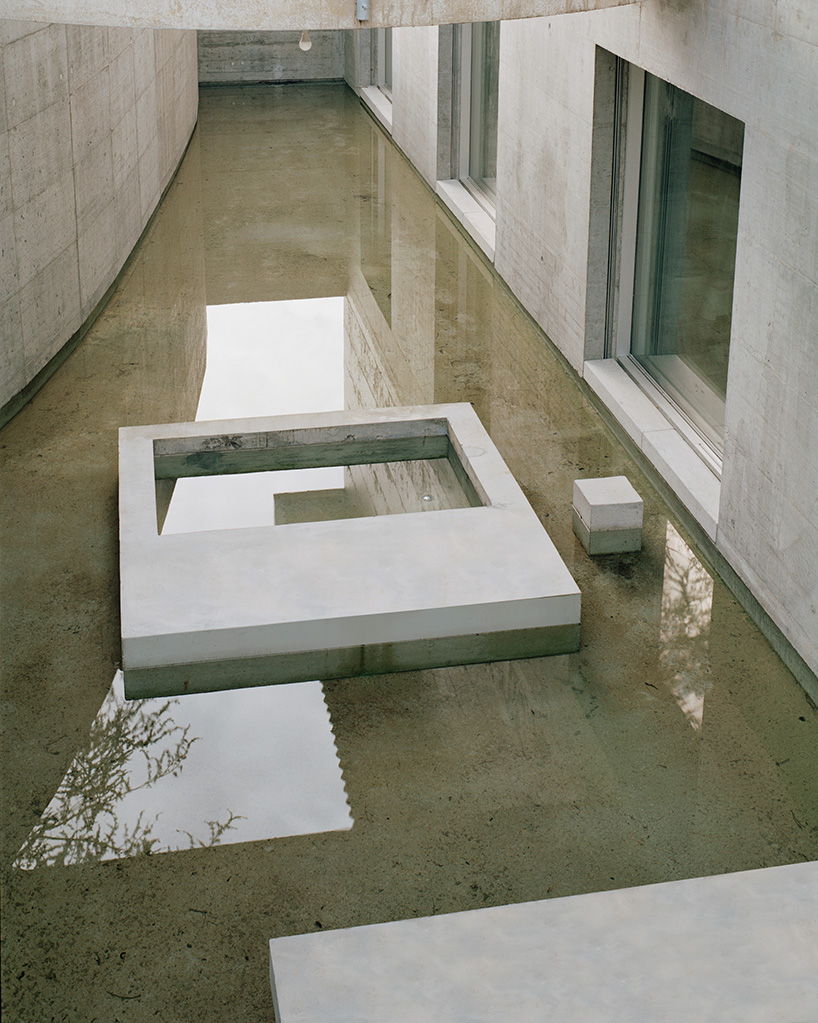 villa montasser's reflections dance on water creating symmetrical geometric compositions