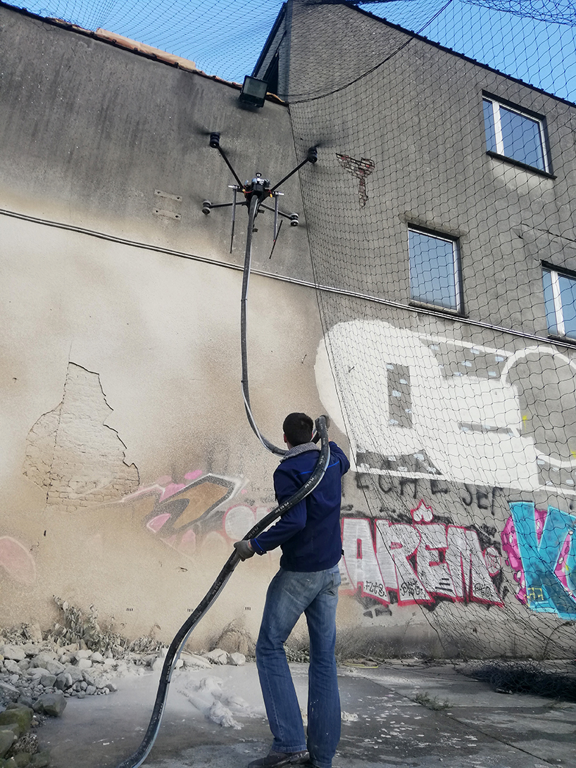 MuDD architects uses drone spraying to create a mural in brussels