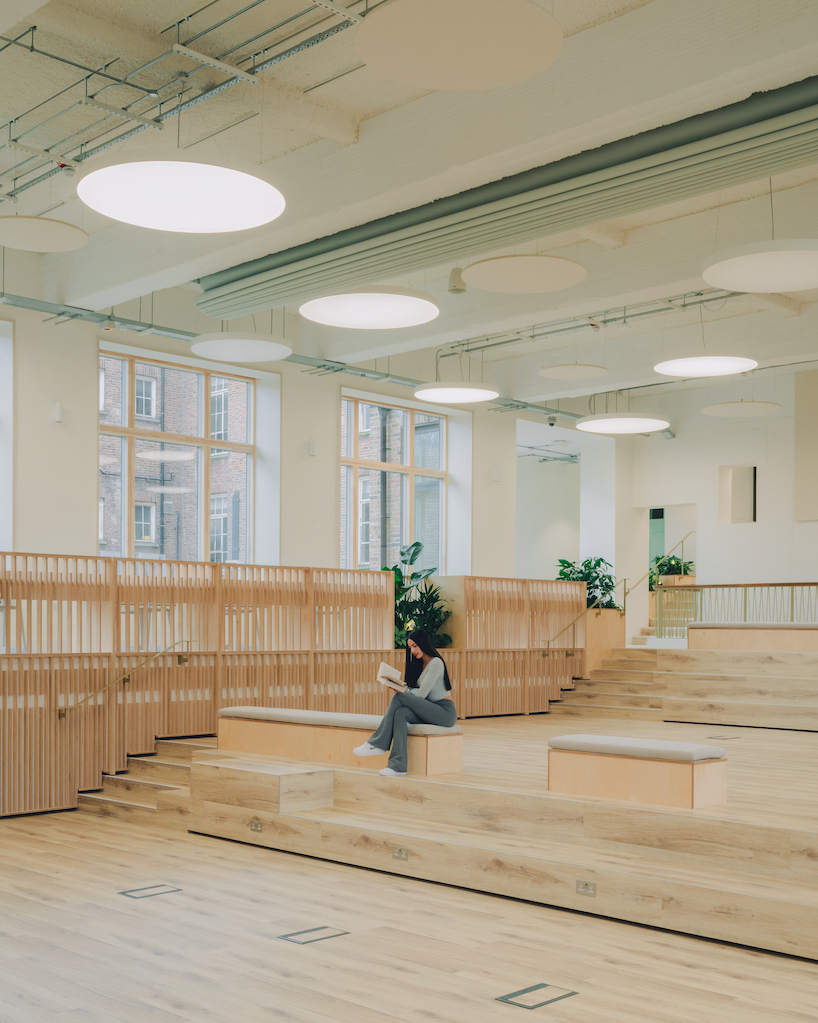 former swimming pool converts into multi-use timber education space for london college