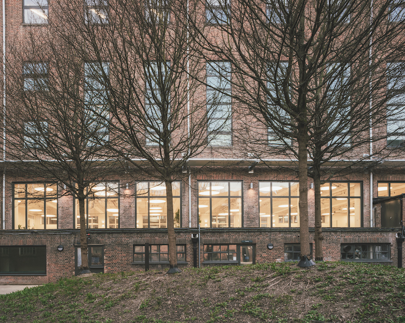 former swimming pool converts into multi-use timber education space for london college