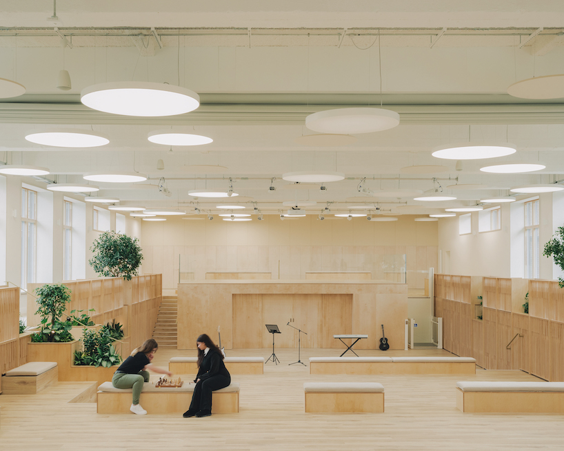 former swimming pool converts into multi-use timber education space for london college