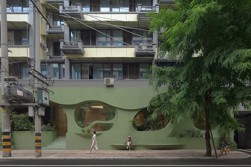 irregular curves bring the nature inside this pastel green café in china 