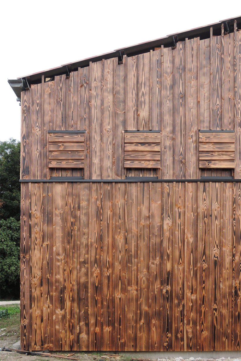 the new facade of a wine cellar acts as a bat shelter 5