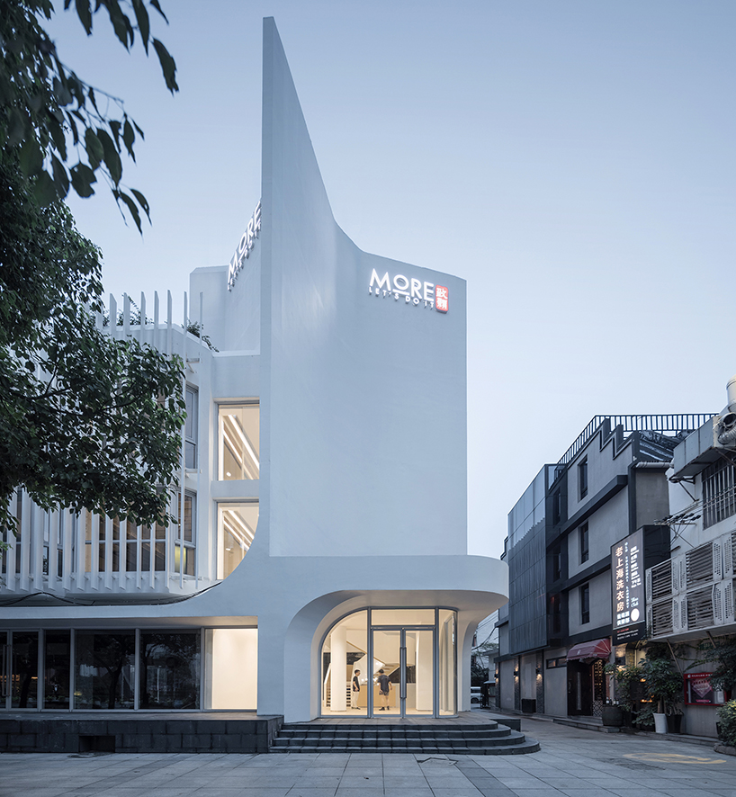 archunits softens renovated shanghai office building by adding a sculptural staircase