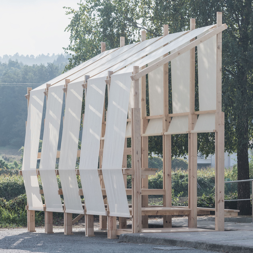 erazo pugliese and cesuga cover modular wooden installation's frame with translucent fabrics