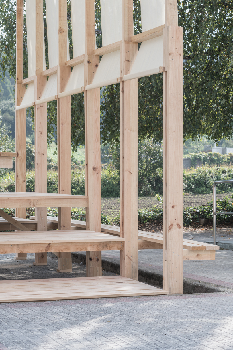 erazo pugliese and cesuga cover modular wooden installation's frame with translucent fabrics