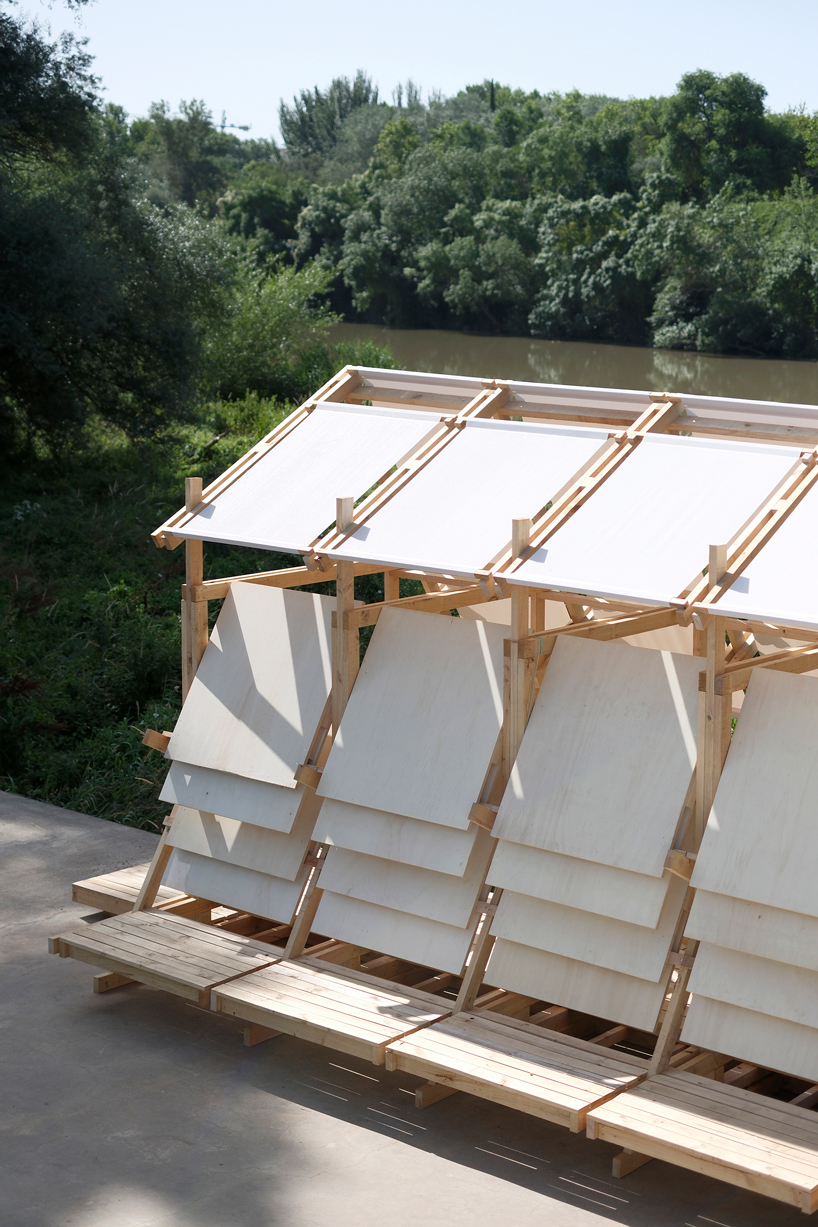 wood and textile installation reconnects river and city during concentrico 2025 3