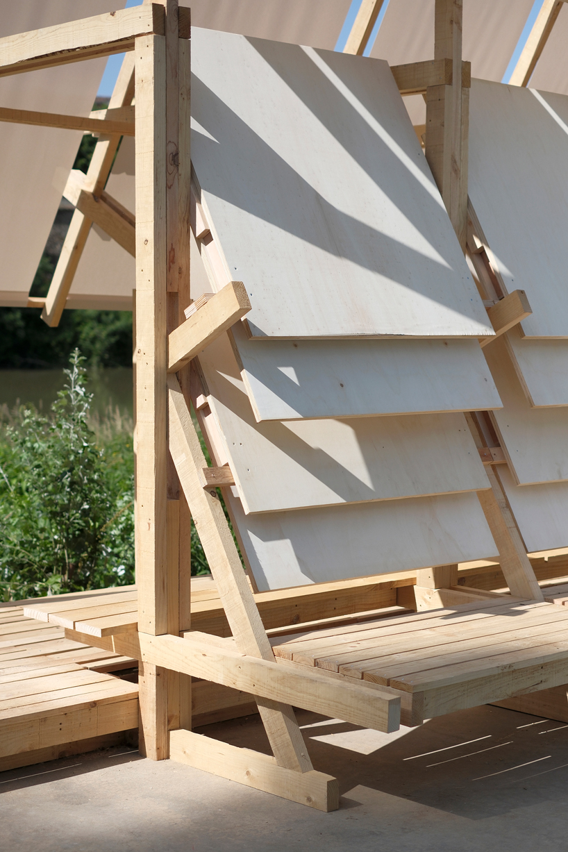 wood and textile installation reconnects river and city during concentrico 2025 8