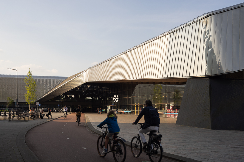 andrew campion captures transformative qualities of light within rotterdam central station