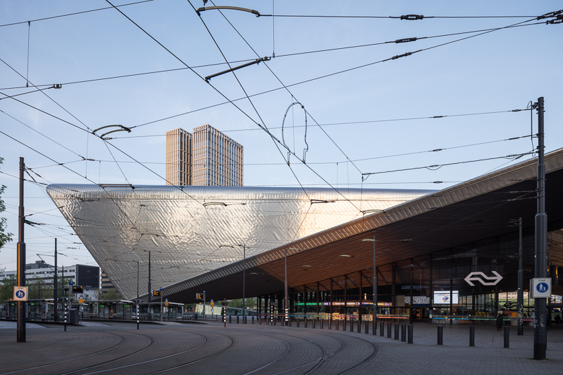 andrew campion captures transformative qualities of light within rotterdam central station