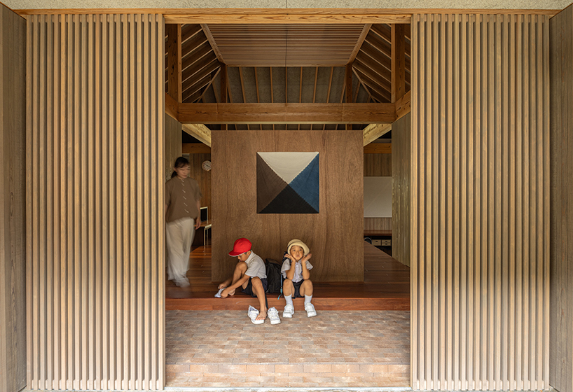 five interconnected timber volumes shape off-grid house on japanese island