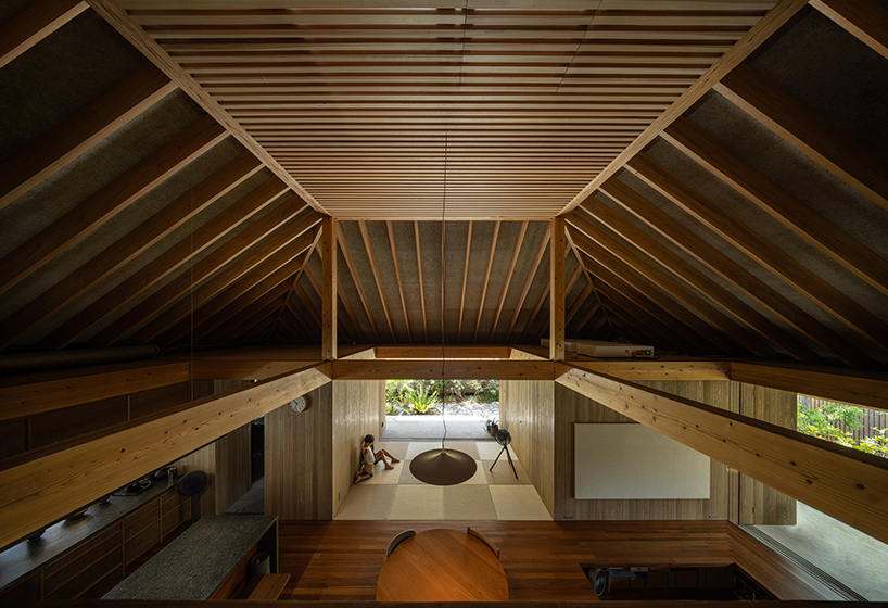 five interconnected timber volumes shape off-grid house on japanese island