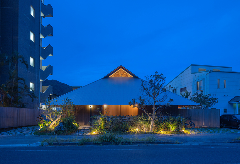 five interconnected timber volumes shape off-grid house on japanese island