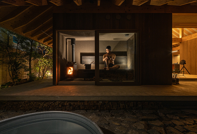 five interconnected timber volumes shape off-grid house on japanese island