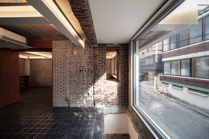 stpmj adds a metal staircase to the front of salon guui in seoul, korea designboom