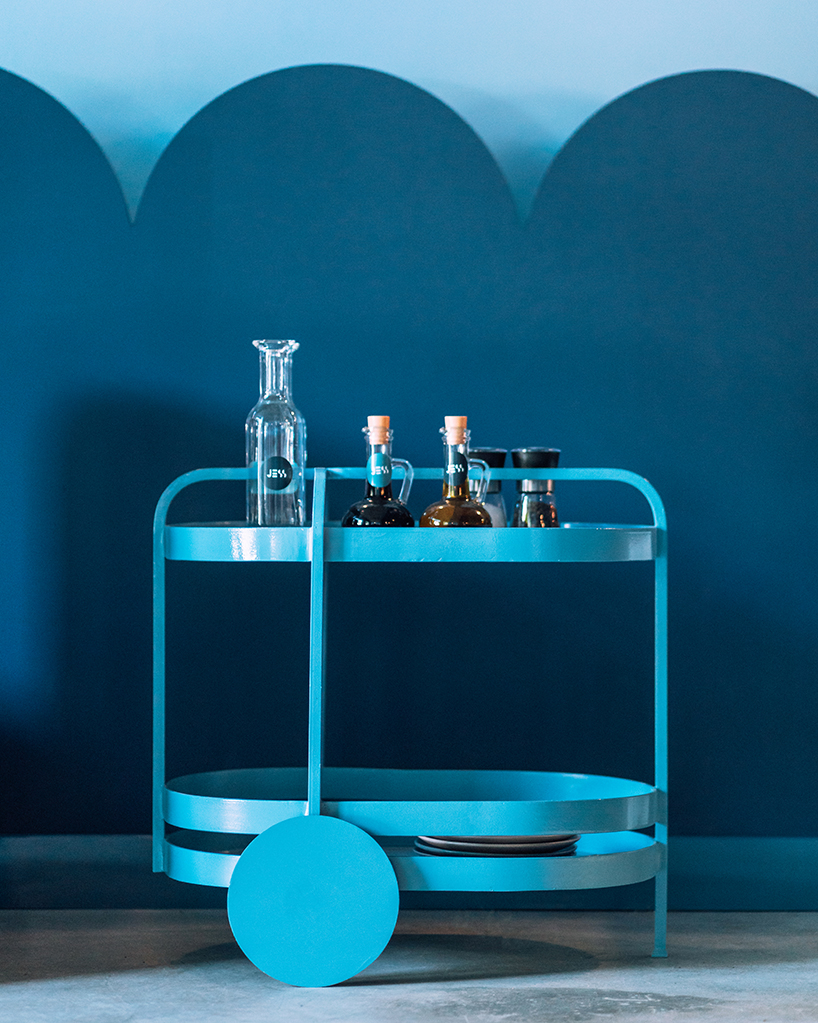 biancoebianca combines soft shapes with colorful terrazo in dramatic romanian restaurant