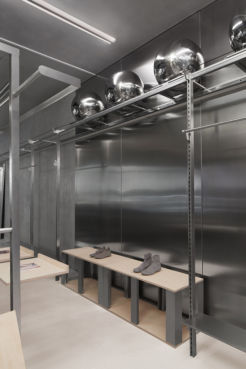 sò studio designs PEU À PEU sports store with large moving spheres in china designboom