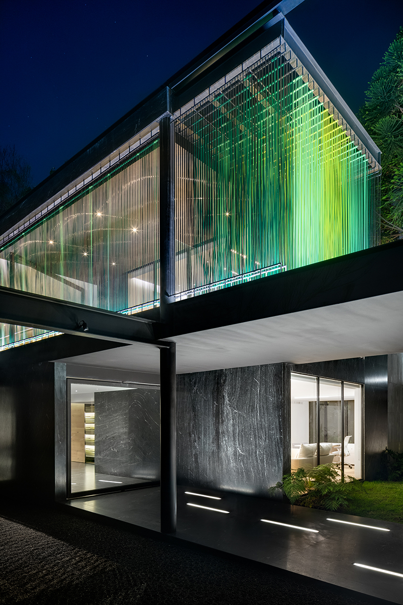 archetonic applies a layer of permeable green cables to studio house façade in mexico city