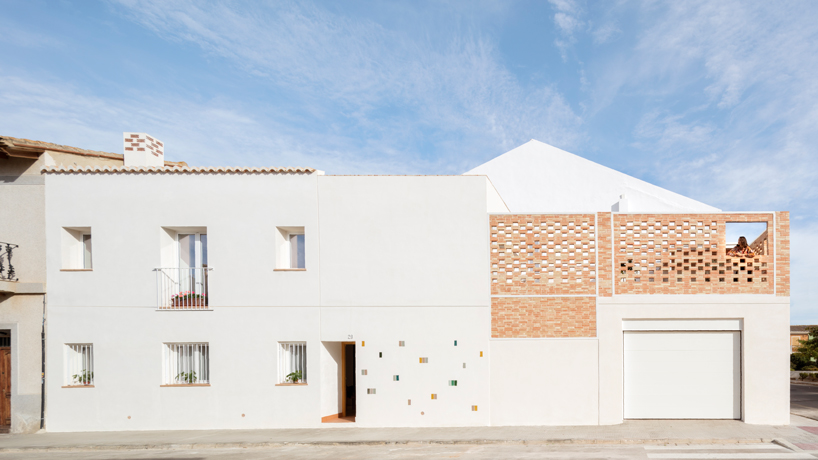 a brick terrace tops this family house in valencia by piano piano studio designboom