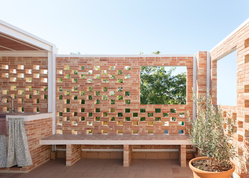 a brick terrace tops this family house in valencia by piano piano studio designboom