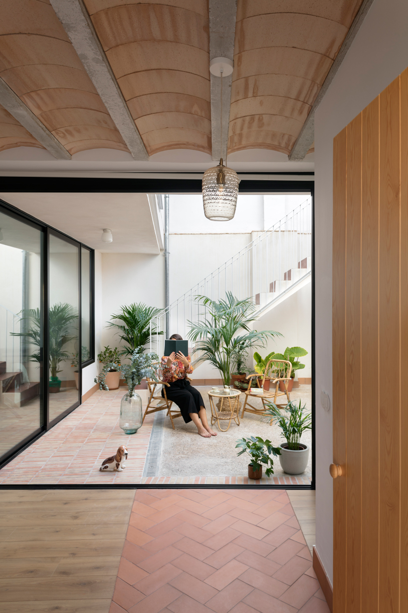 a brick terrace tops this family house in valencia by piano piano studio designboom