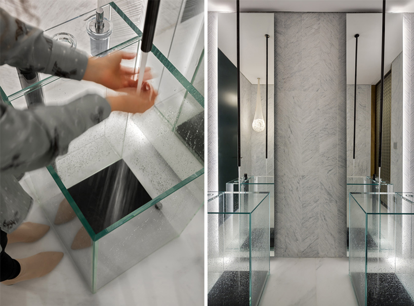 yoma architects clads luxury penthouse in marble and brass detailing in jerusalem