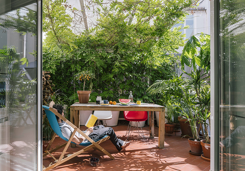gon architects designs the G house in madrid with garden terraces and pops of color