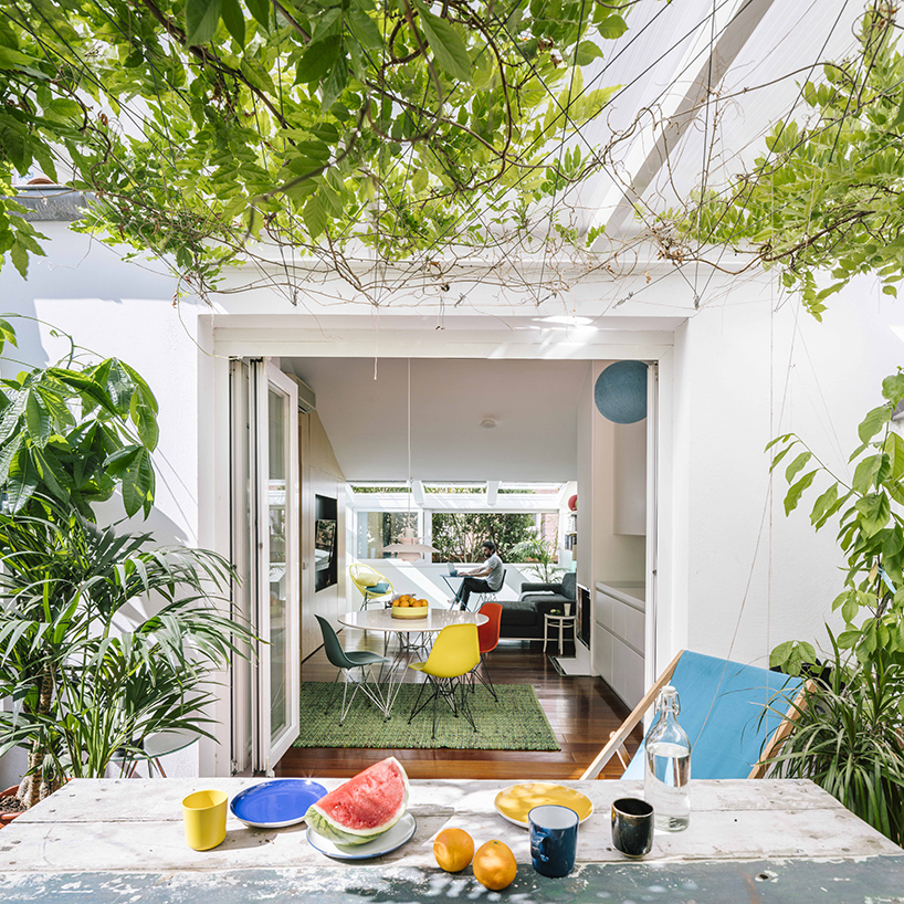 gon architects designs the G house in madrid with garden terraces and pops of color