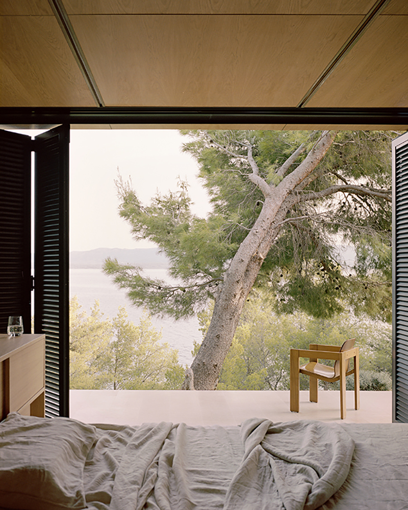 studio bressan's clustered private villa emerges from a clifftop forest in croatia