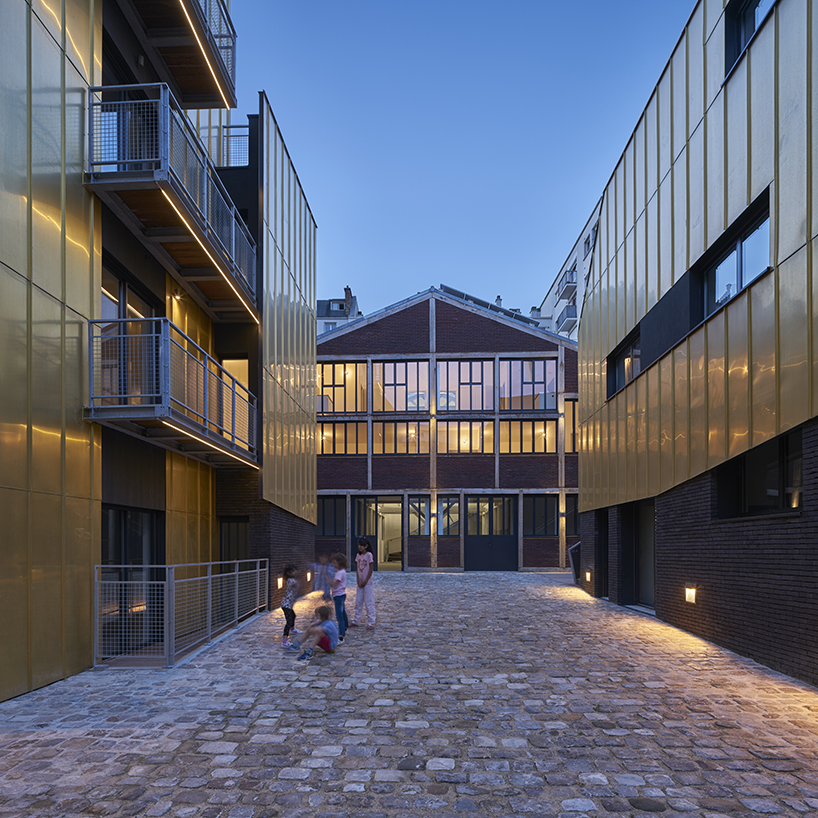 gold metal panels clad metek architecture's social housing project in paris