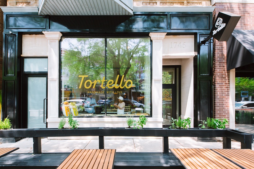 siren betty design suspends a teal blue vespa in chicago's tortello pasta shop designboom