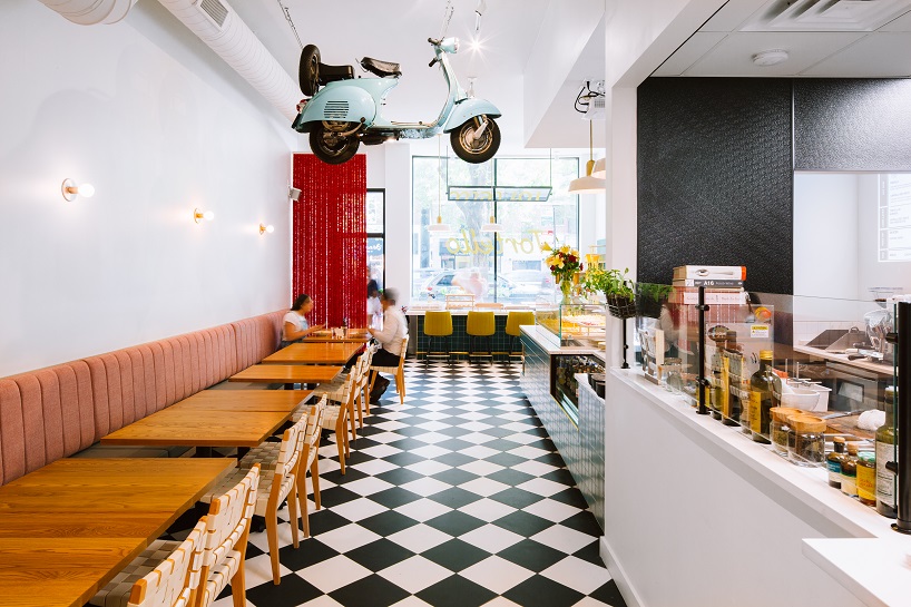 siren betty design suspends a teal blue vespa in chicago's tortello pasta shop designboom
