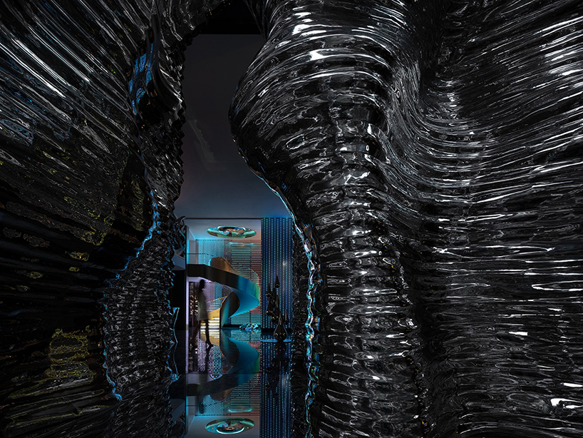 foshan topway design creates reflective canyon-like steel interior for 'zcmetal' exhibition hall in china