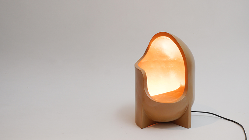 curving lines of puigmigliore's ceramic terra lamps emit diffuse lighting
