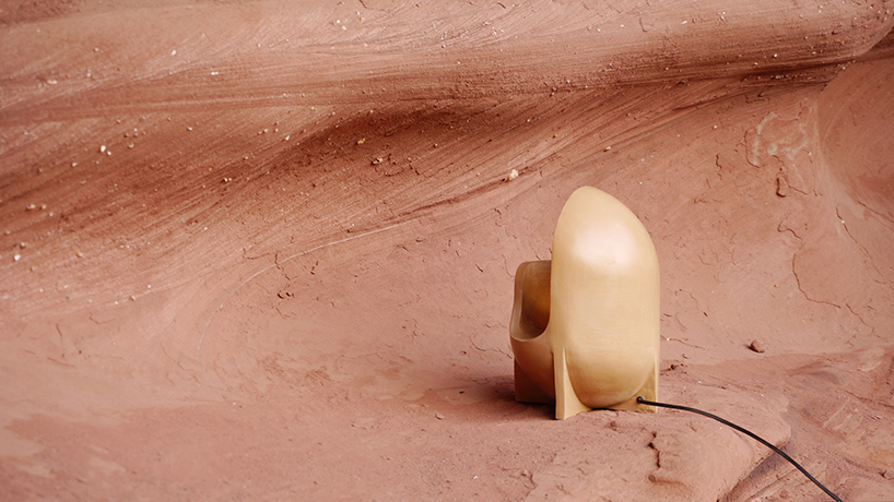 curving lines of puigmigliore's ceramic terra lamps emit diffuse lighting