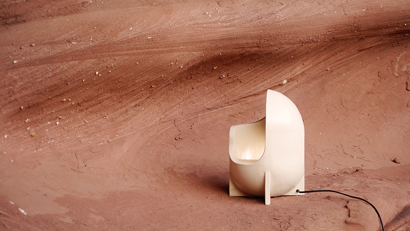 curving lines of puigmigliore's ceramic terra lamps emit diffuse lighting