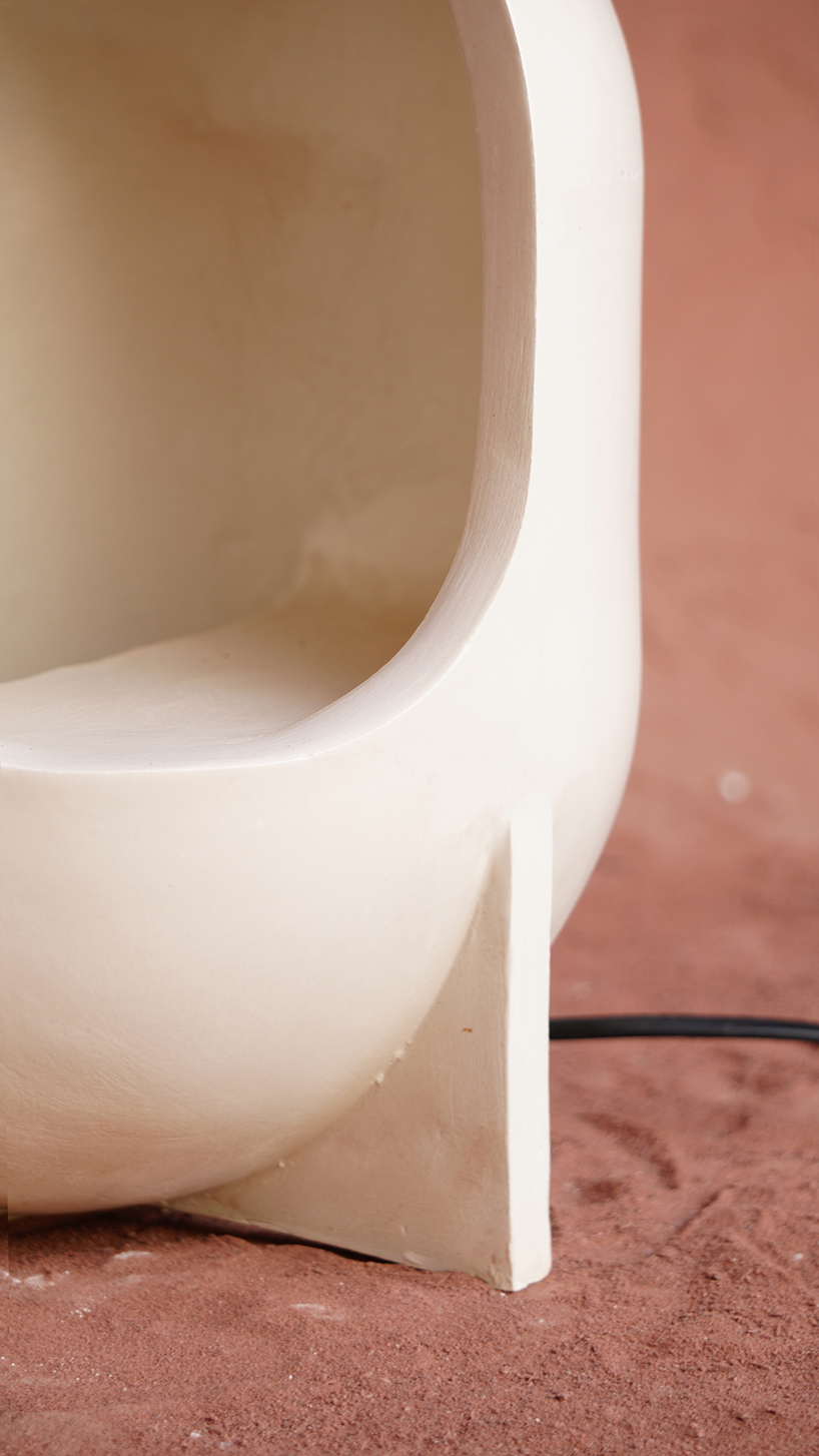 curving lines of puigmigliore's ceramic terra lamps emit diffuse lighting