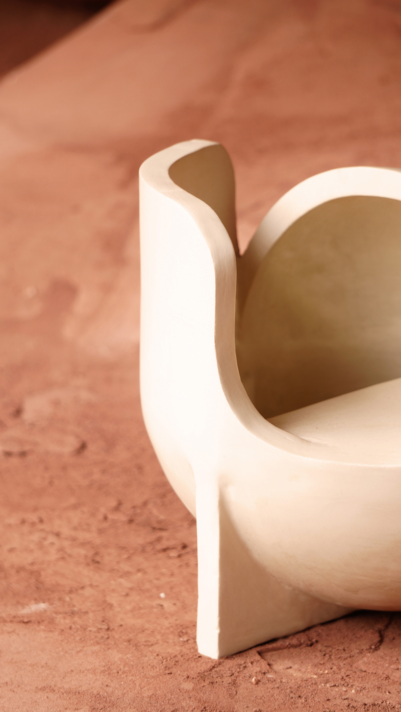 curving lines of puigmigliore's ceramic terra lamps emit diffuse lighting