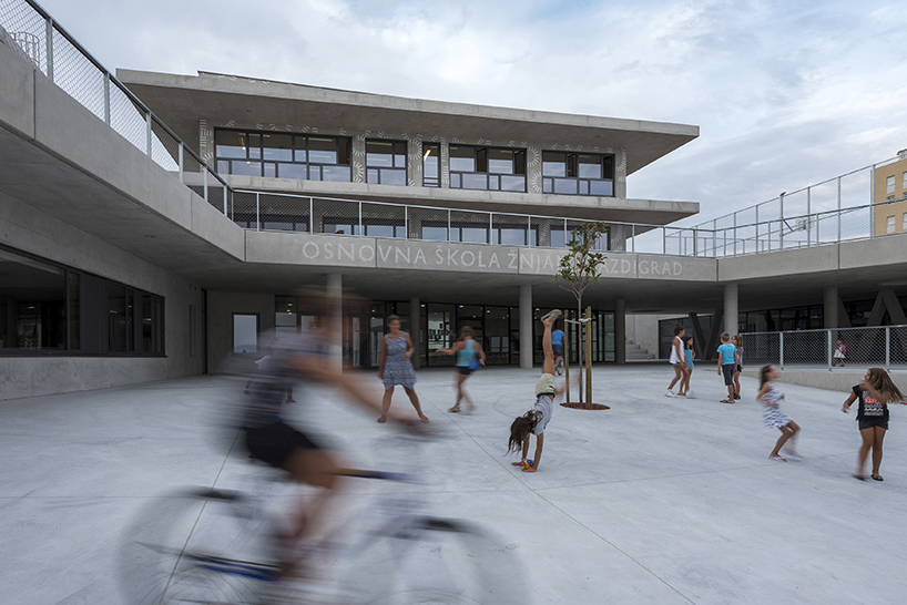 x3m builds a new school in croatia to incorporate large outdoor spaces for the community