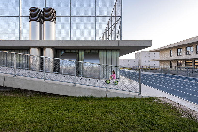 x3m builds a new school in croatia to incorporate large outdoor spaces for the community