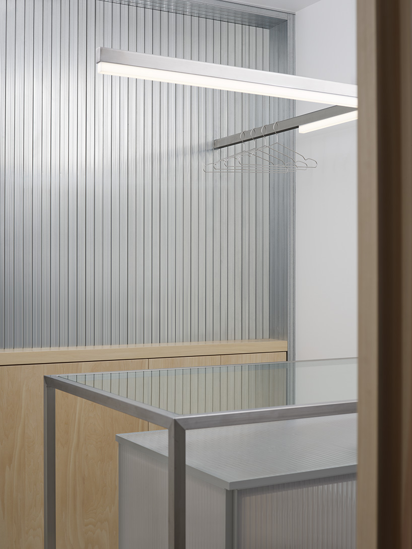 aluminum and polycarbonate plates add a modern twist to minimal japanese hair salon