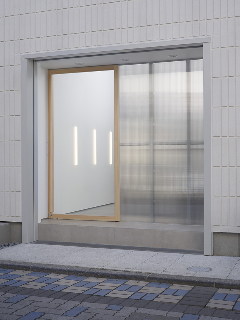 aluminum and polycarbonate plates add a modern twist to minimal japanese hair salon