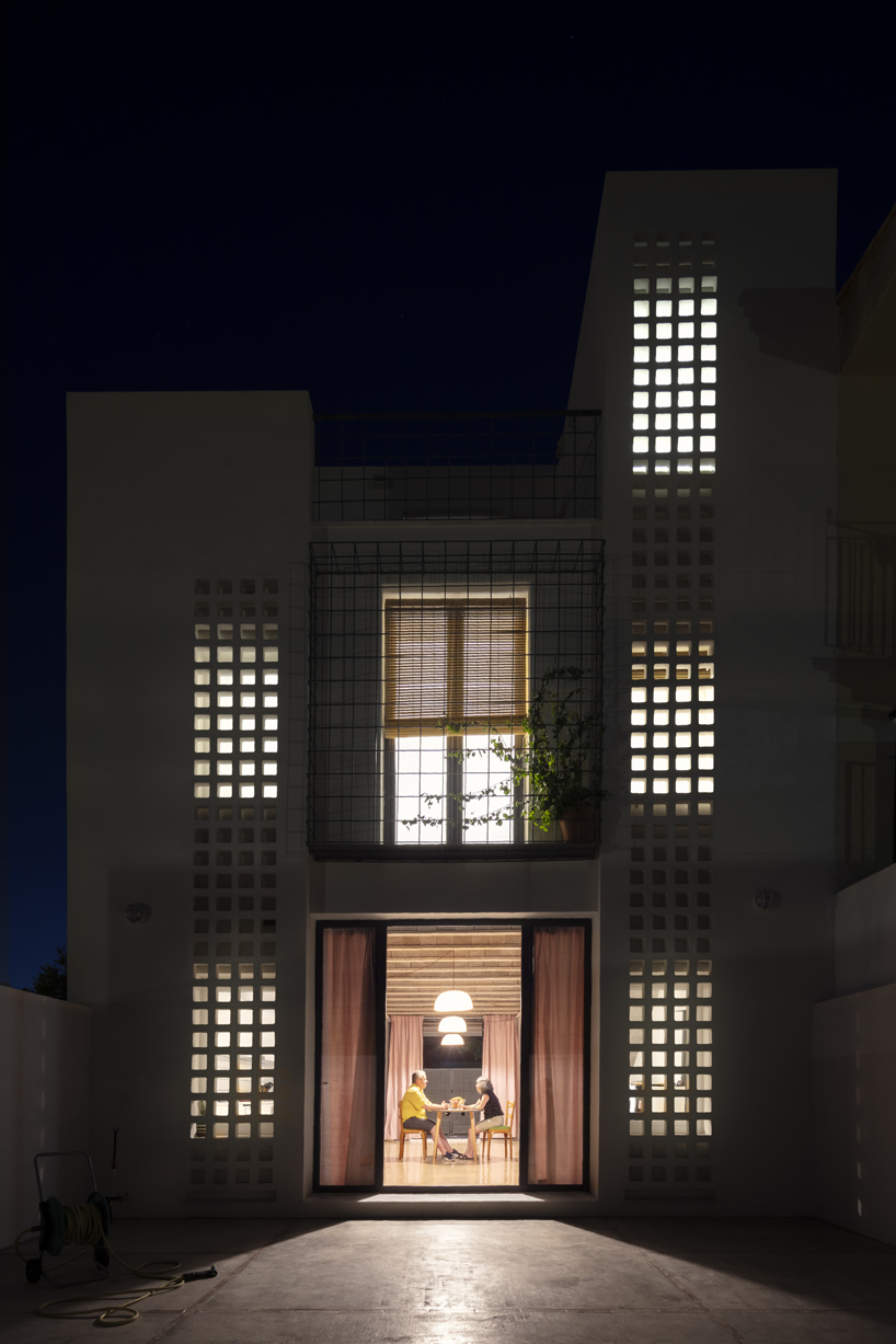 CRUX arquitectos creates light, flexible spaces for REI house in spain designboom