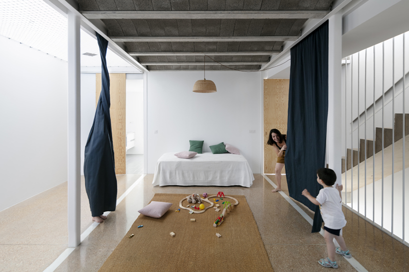 CRUX arquitectos creates light, flexible spaces for REI house in spain designboom