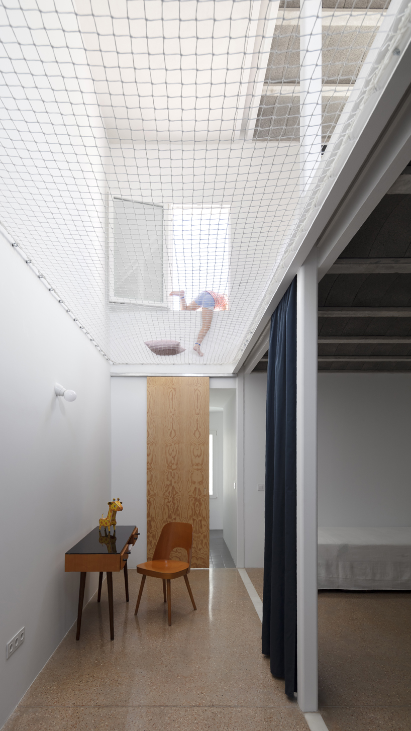 CRUX arquitectos creates light, flexible spaces for REI house in spain designboom