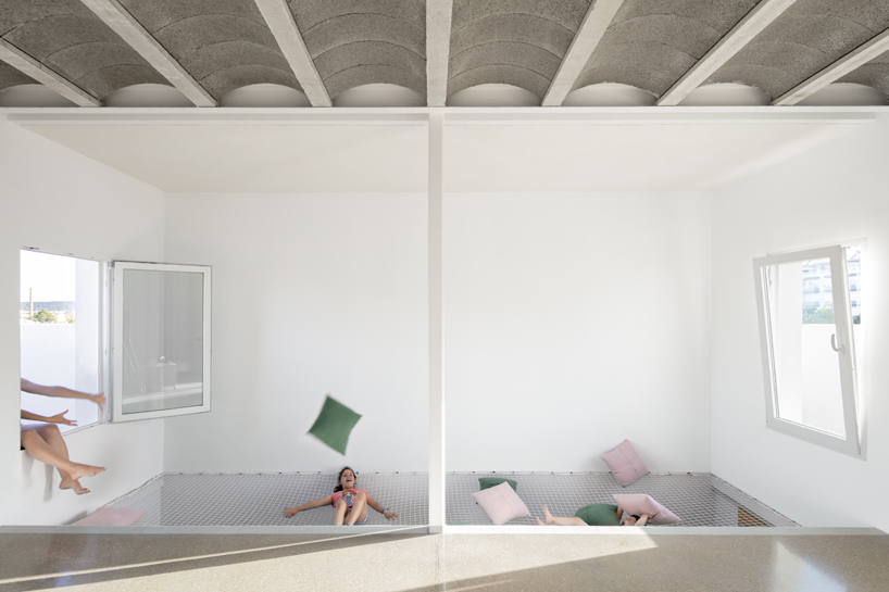 CRUX arquitectos creates light, flexible spaces for REI house in spain designboom